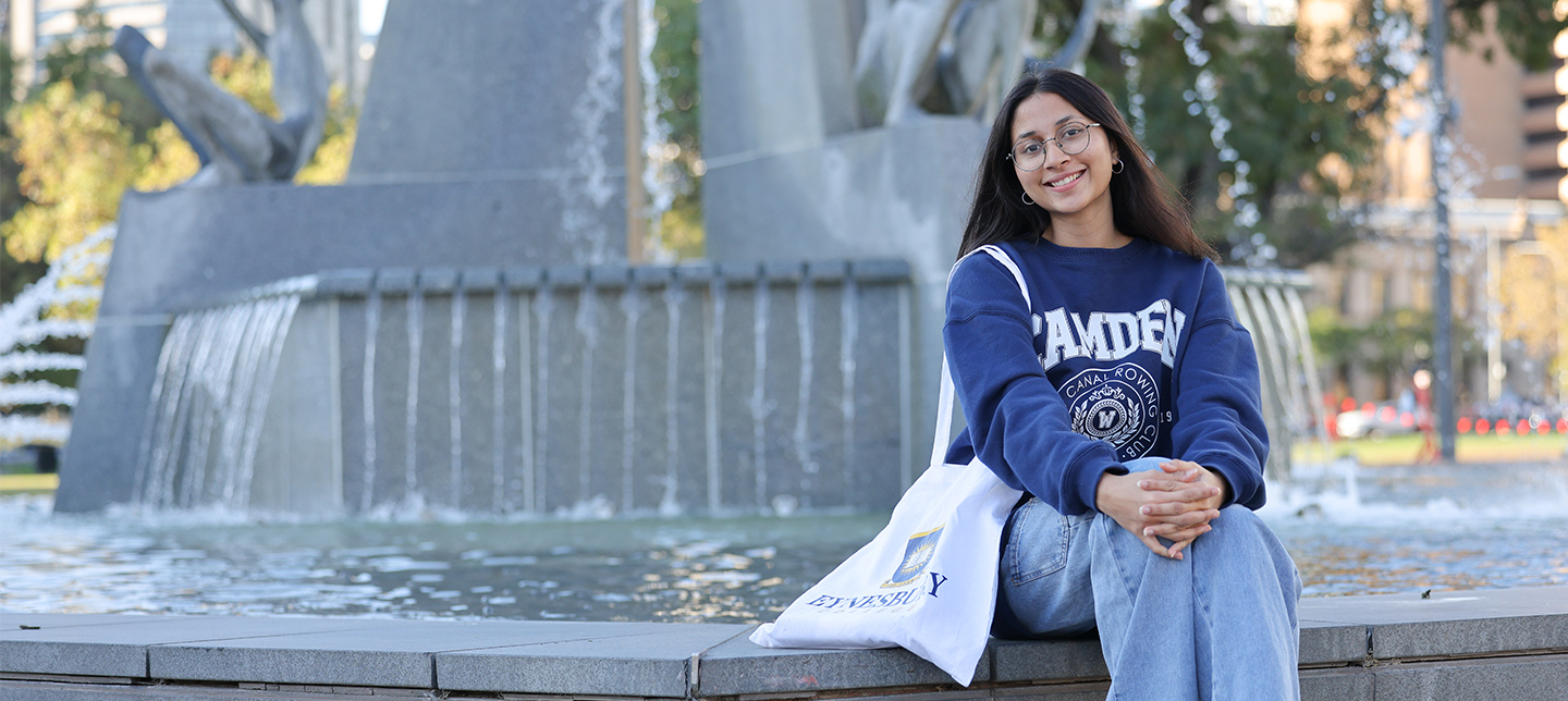 girl student sitting in college