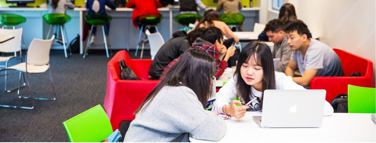 Females looking at phone