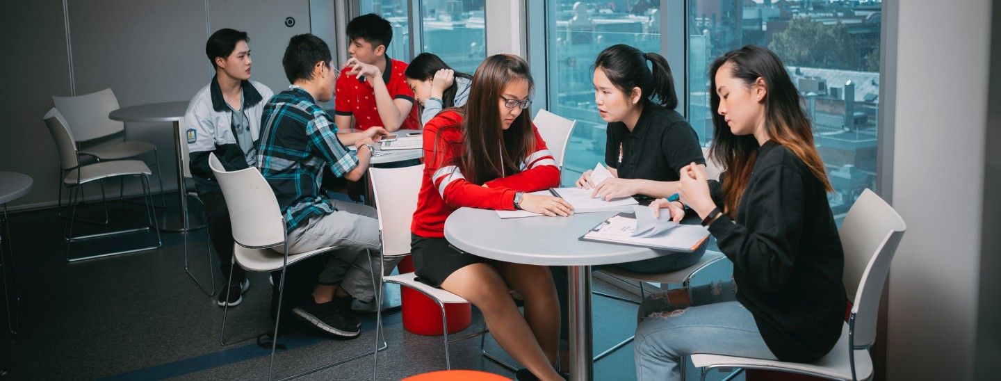 Females sitting and talking