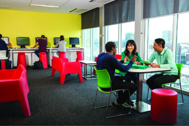 Group sitting and smiling