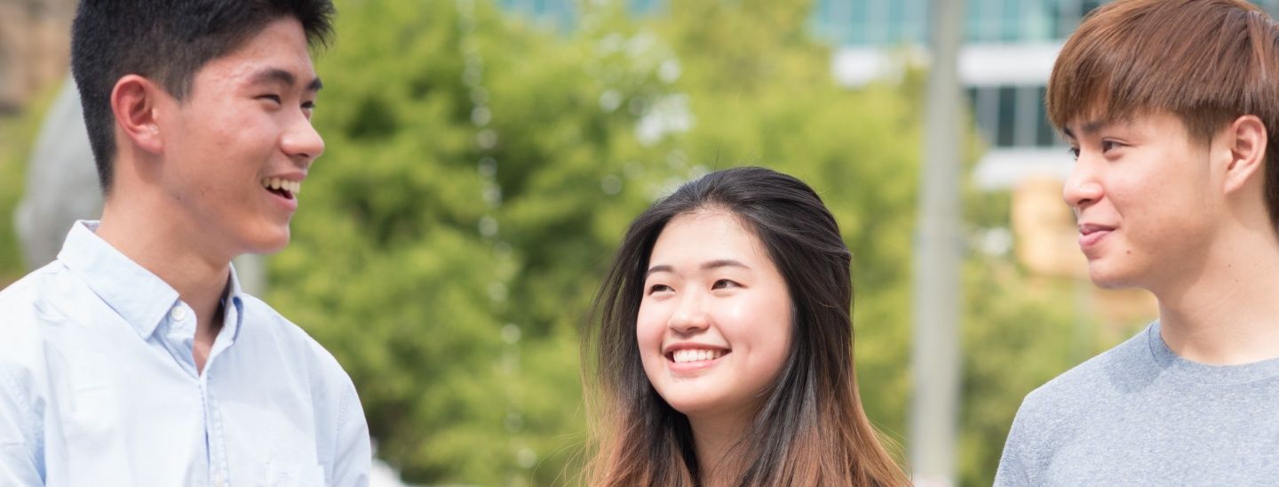 Group standing and smiling