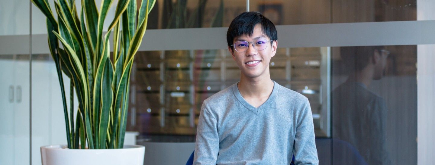 Male sitting in chair