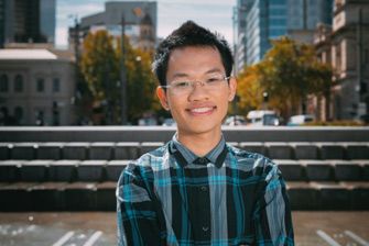 Off campus male smiling