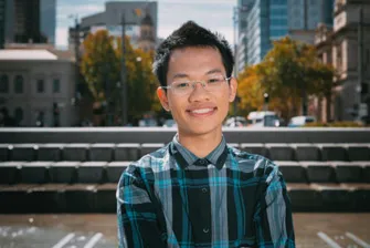 Off campus male smiling